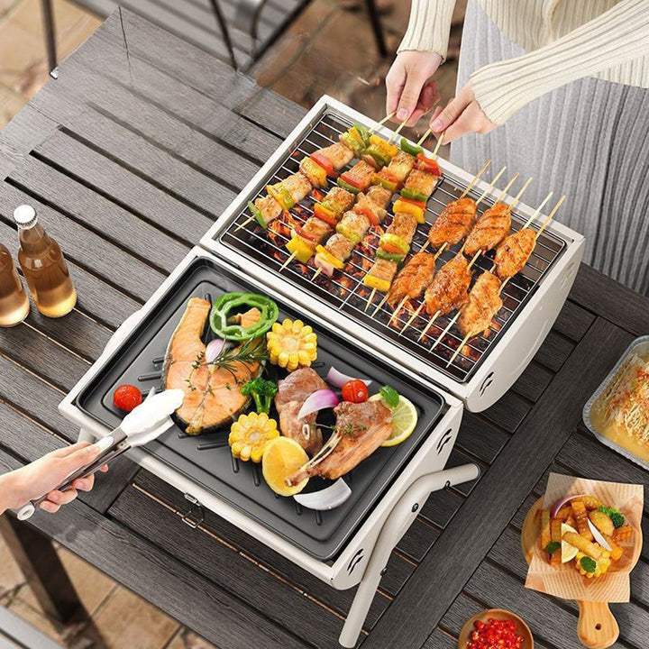 Charcoal grill for camping, featuring a convenient folding design and baking pan.