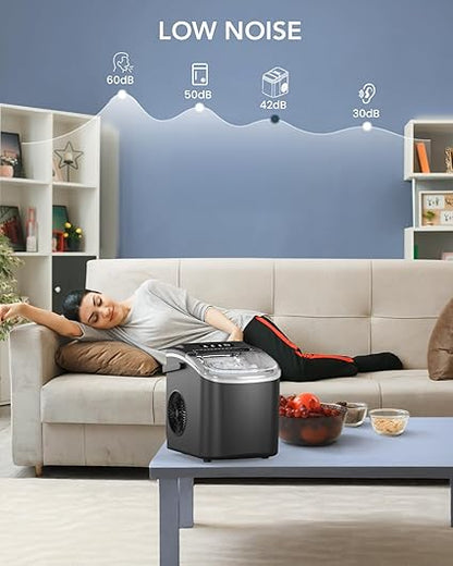 Sleek portable ice maker, a compact kitchen appliance for any countertop. Includes ice scoop.