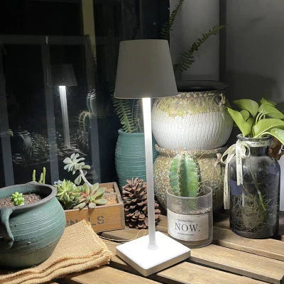 Unisex portable dimmable LED table lamp, versatile wireless lighting for home decor. Rechargeable.
