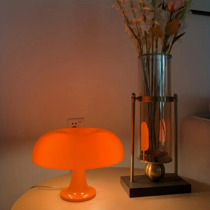 Modern mushroom LED lamp, portable and stylish, ideal for mood lighting on any desk or table.