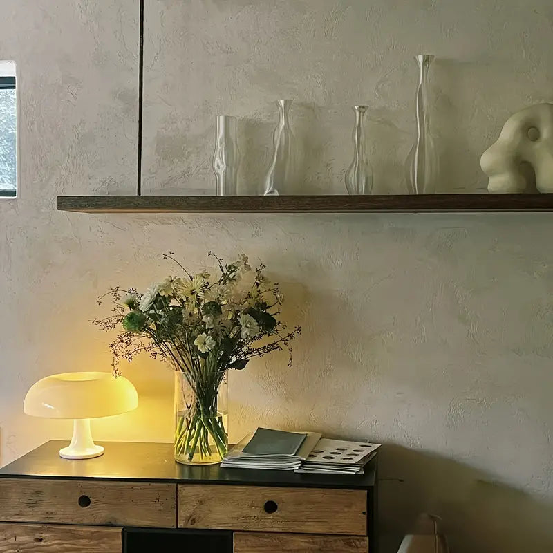 Rechargeable mushroom lamp, an elegant portable LED light creating sophisticated ambiance.