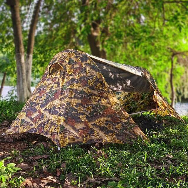 Durable camo portable elevated camping cot, ideal for outdoor enthusiasts' sleeping gear.