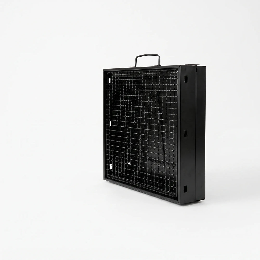 Folding charcoal BBQ grill for tailgating & outdoor cooking. Durable, portable steel design.