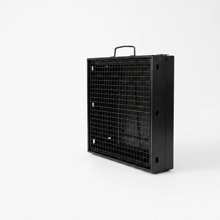Folding charcoal BBQ grill for tailgating & outdoor cooking. Durable, portable steel design.