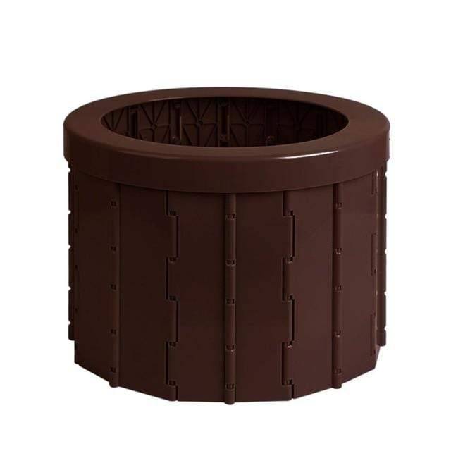 Portable toilet seat folded for easy transport, ideal for camping and outdoor adventures