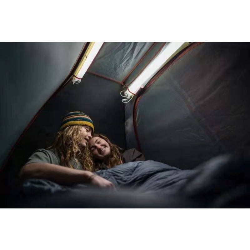 Magnetic LED camping lantern illuminated, showcasing soft, diffused light, perfect for tent or emergency use.
