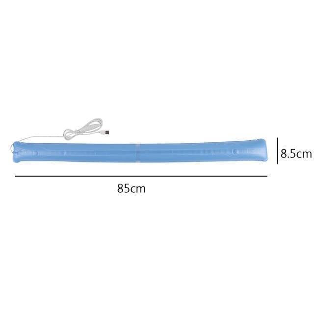 User easily inflating portable magnetic LED camping lantern, highlighting its ease of setup and portability.