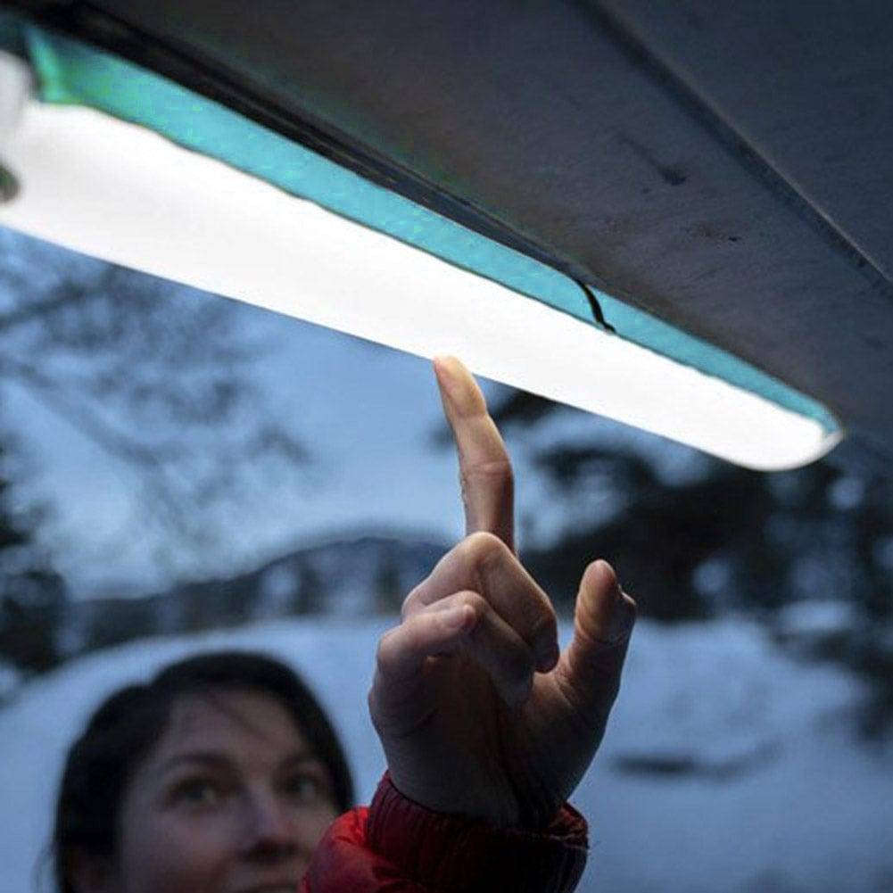 Two inflatable LED lanterns, one deflated and one inflated, emphasizing compact storage and bright output.