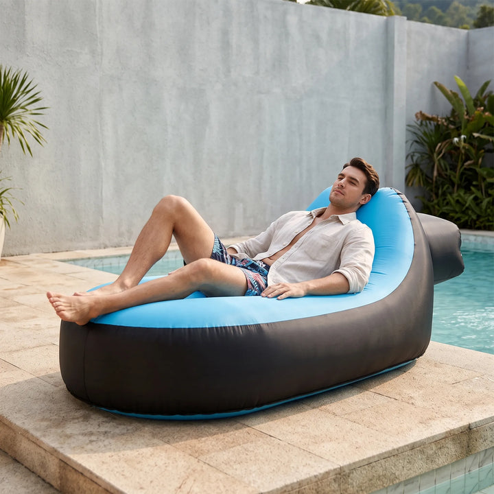 Portable inflatable lounger for ultimate outdoor relaxation, perfect for beach, camping, and backyard comfort.