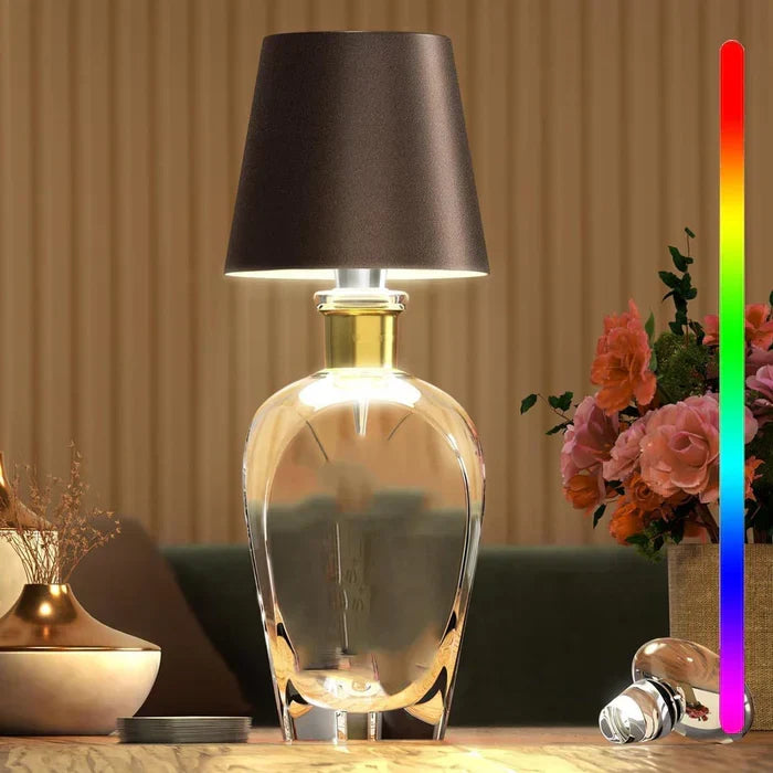 Durable GlowBottle portable LED lamp for outdoor use. Wireless, dimmable, & weather-resistant.