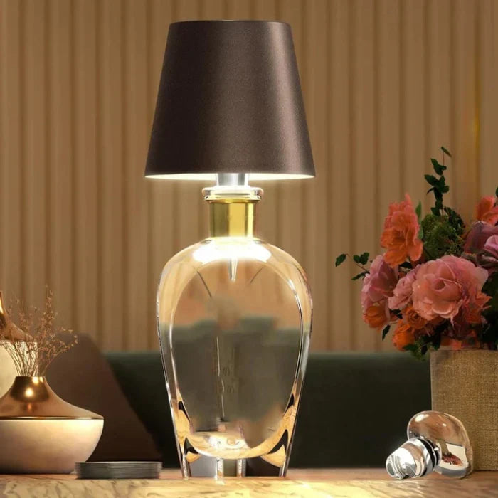 Rechargeable GlowBottle LED lamp, wireless & portable, perfect for indoor & outdoor ambient lighting.