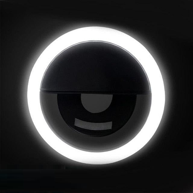 USB rechargeable clip-on LED ring light. Versatile photo accessory for phones, tablets & laptops.