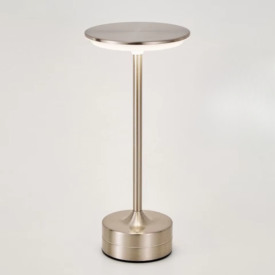 Portable LED touch sensor table lamp, USB rechargeable for bedside or desk.