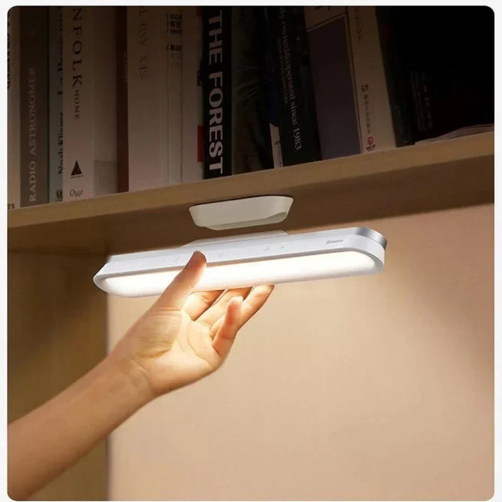 Sleek wireless LED lamp, magnetic for easy placement, with intuitive touch control for modern workspaces.