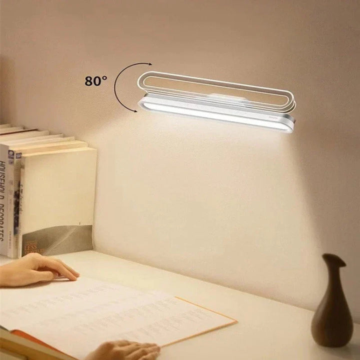 Flexible magnetic LED task light, portable & dimmable via touch sensor, enhances productivity in any area.