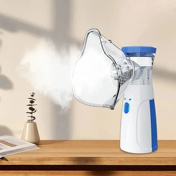 Portable Mesh Nebulizer for adults & kids, offering quiet respiratory relief. USB rechargeable for travel.