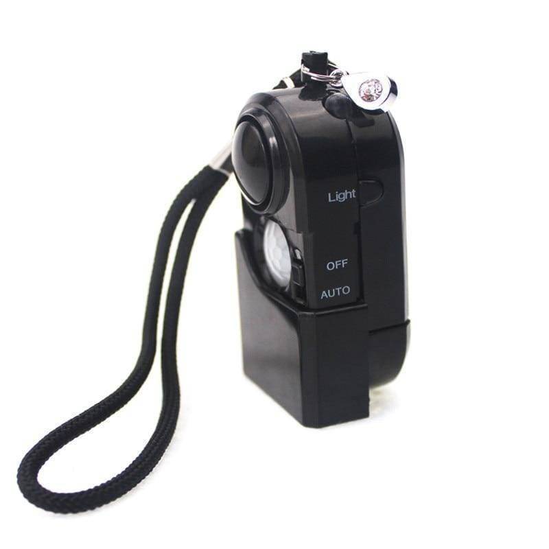 Portable mini PIR infrared motion sensor alarm for personal safety, ideal for camping and travel security