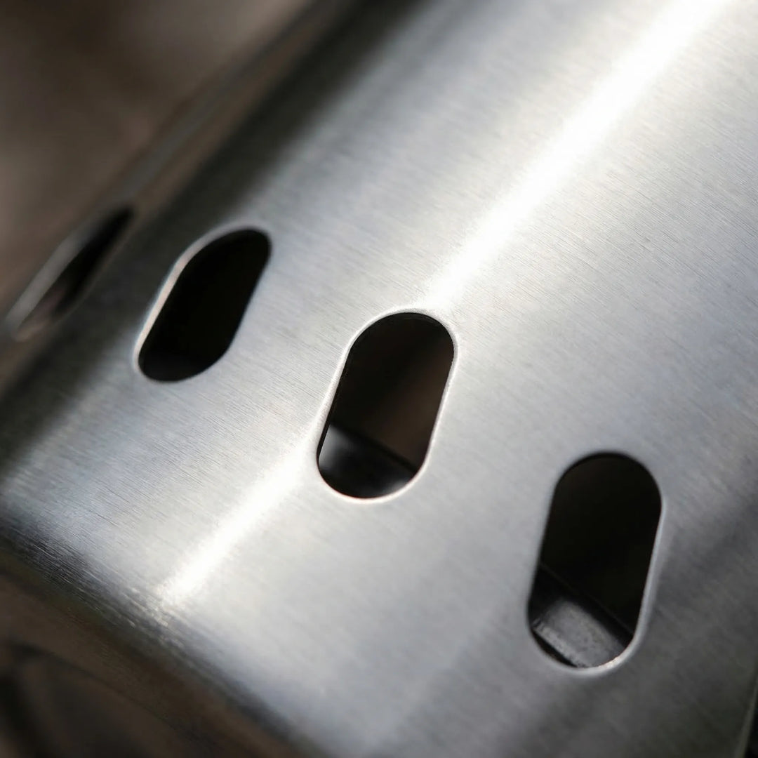 Durable stainless steel outdoor wood-burning camping stove. Portable design, perfect for hiking and survival cooking.