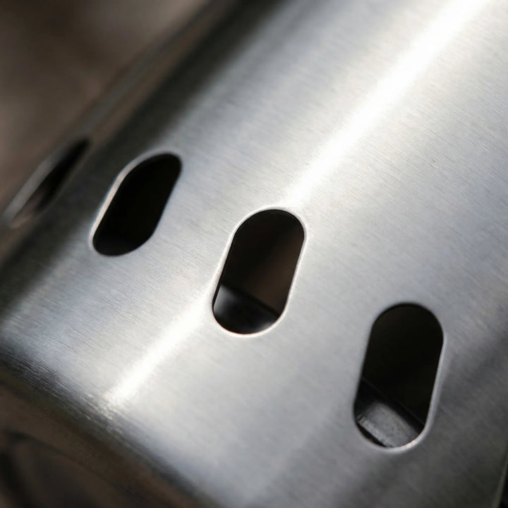 Durable stainless steel outdoor wood-burning camping stove. Portable design, perfect for hiking and survival cooking.