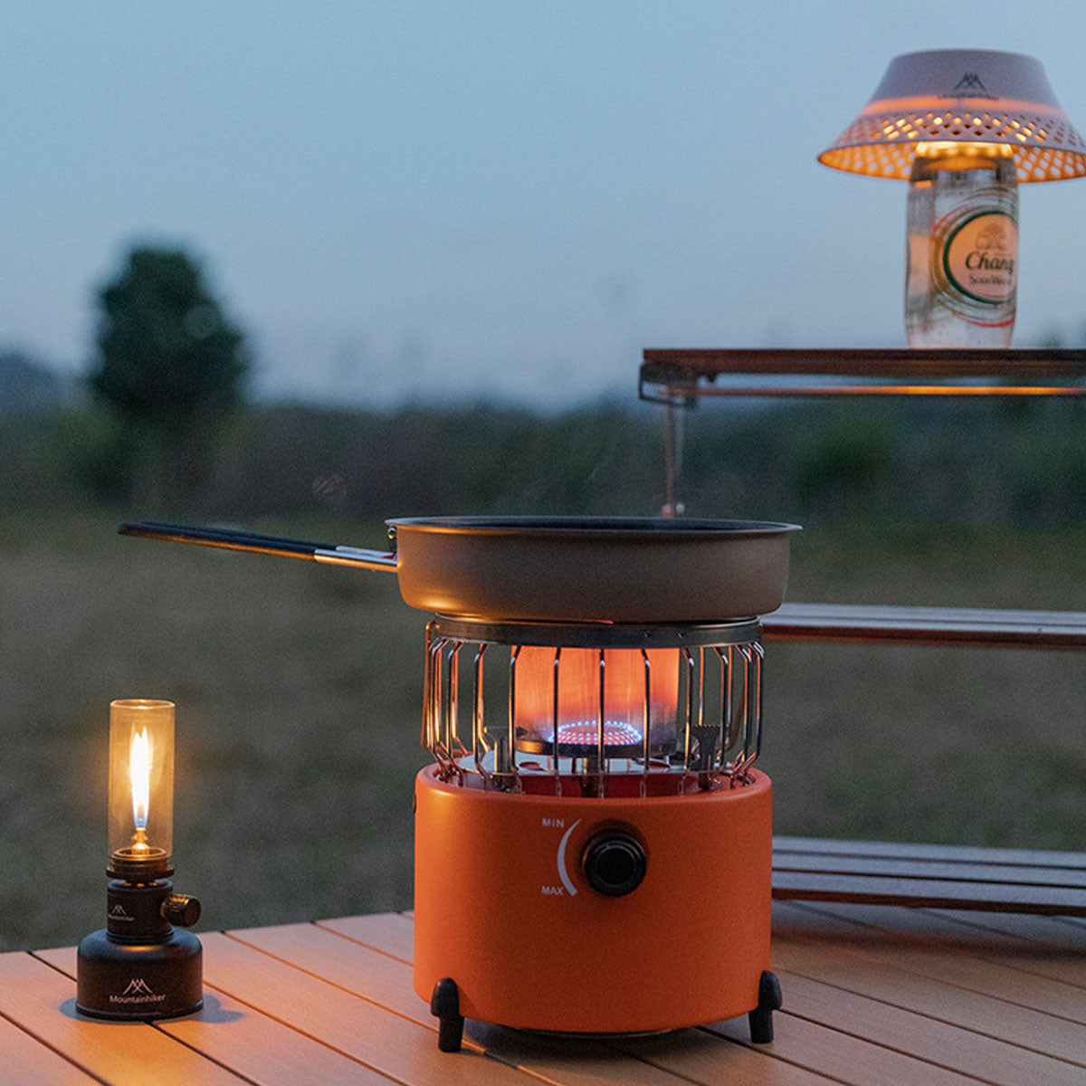 Compact camping stove with adjustable flame for outdoor cooking, great for travel gear