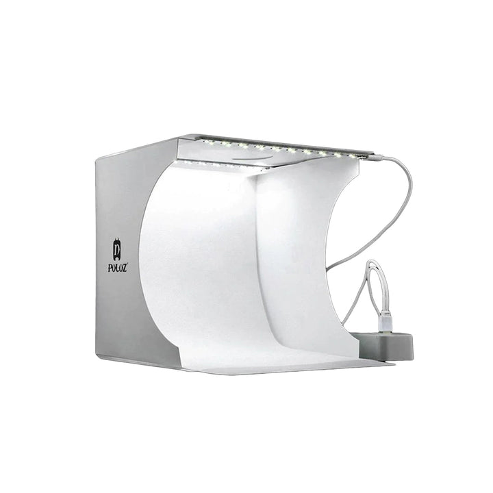 Portable photography studio lightbox with bright LED lighting for professional product photos.