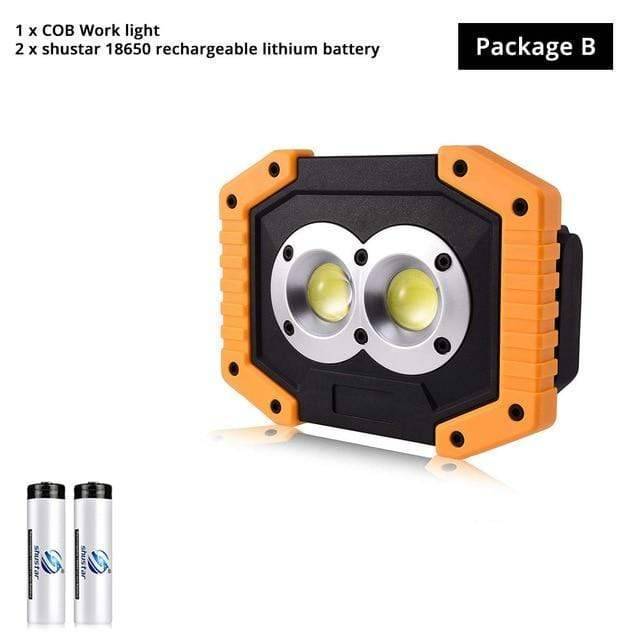 Rechargeable LED spotlight with handle, perfect for camping, emergency, and workshops