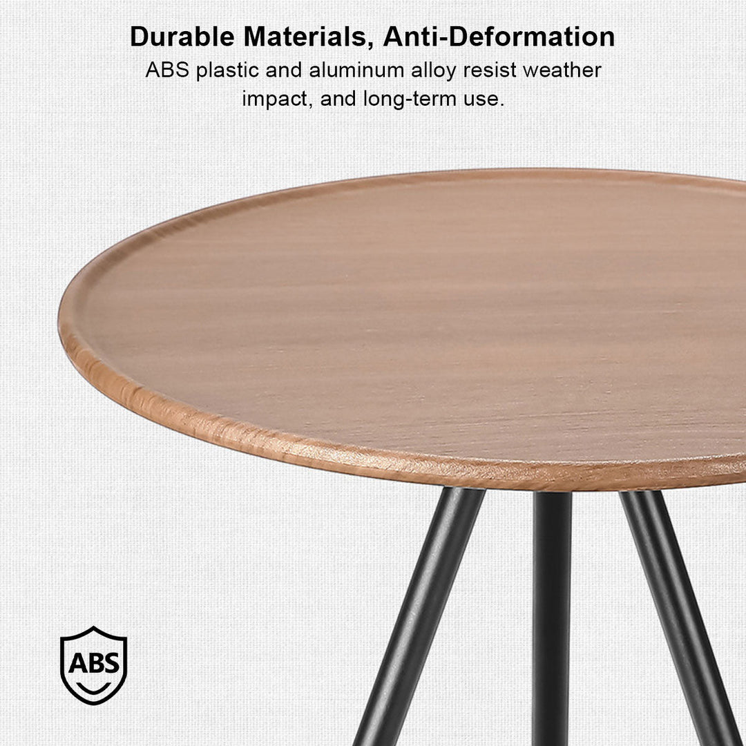 Folding round picnic table with mesh pocket, offering practical outdoor convenience