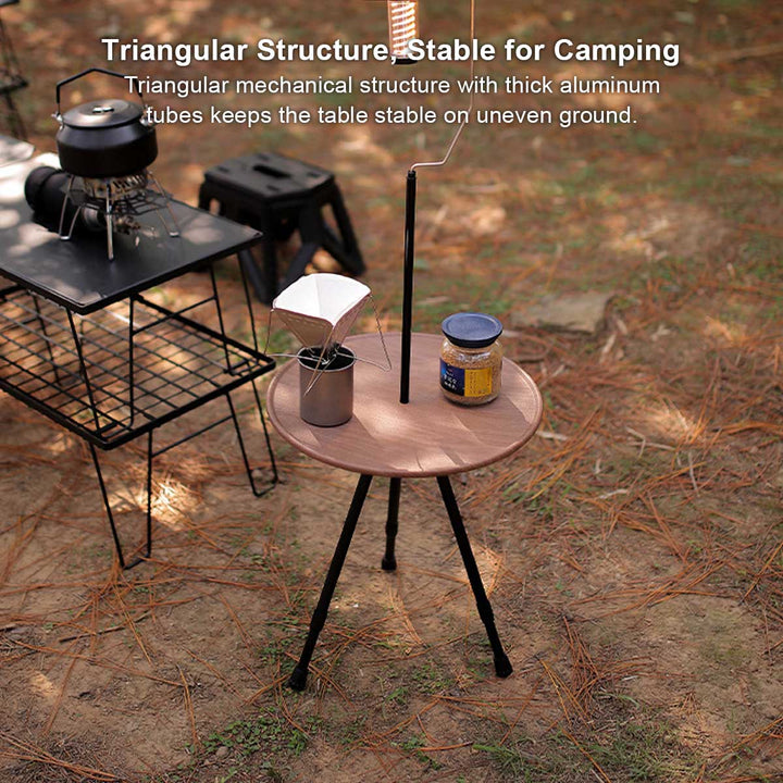Compact folding camping table, round design with integrated mesh storage pocket