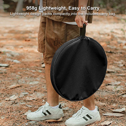 Round outdoor table with built-in mesh pocket, easily foldable for camping trips