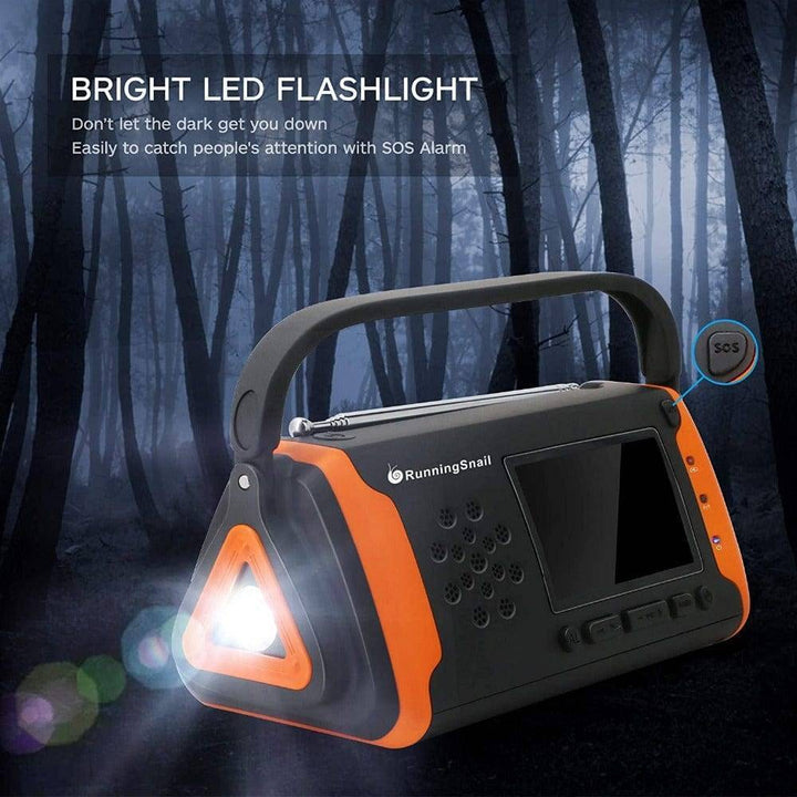 Hands-on view of portable solar emergency radio, showing power bank and flashlight features