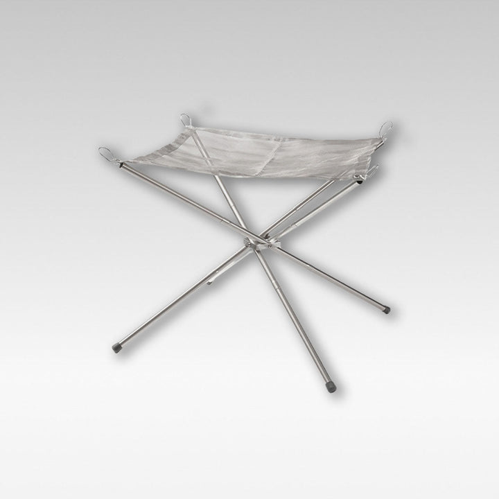Portable stainless steel camping fire pit with grill rack, ideal for outdoor cooking and campfires.