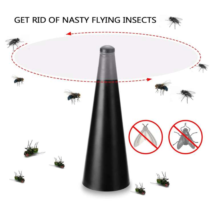 Close-up of a portable fly repellent fan on a picnic table, keeping food safe during outdoor BBQ