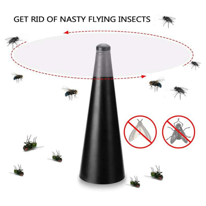 Close-up of a portable fly repellent fan on a picnic table, keeping food safe during outdoor BBQ