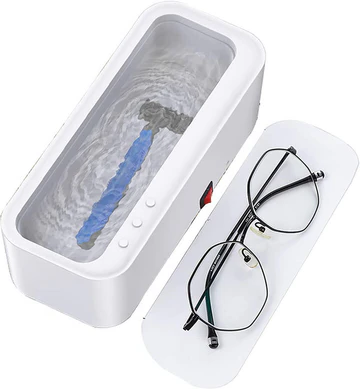 Compact portable ultrasonic cleaner. Deep cleans jewelry, eyeglasses, watches, and makeup brushes for personal care.