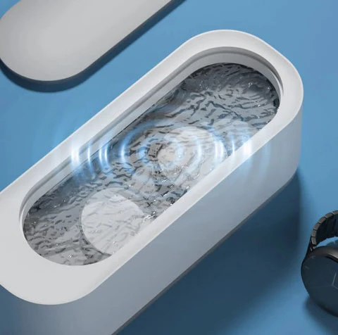 Ultrasonic deep cleaning device. Portable solution for sparkling jewelry, eyeglasses, watches & dental trays.