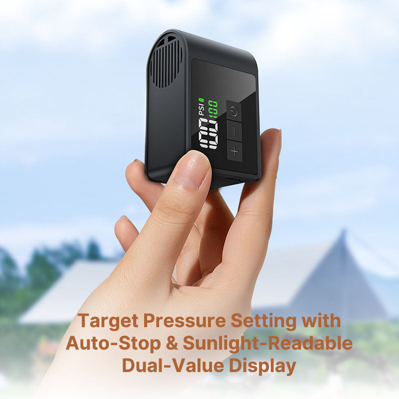 Compact Rapid-Inflate USB-C bike pump, black finish, shown with tire valve for easy use