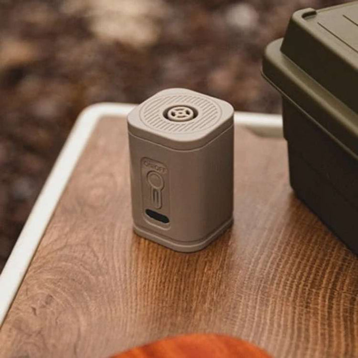 Multi-functional USB air pump for mattresses, featuring a powerful light, essential camping gear accessory.