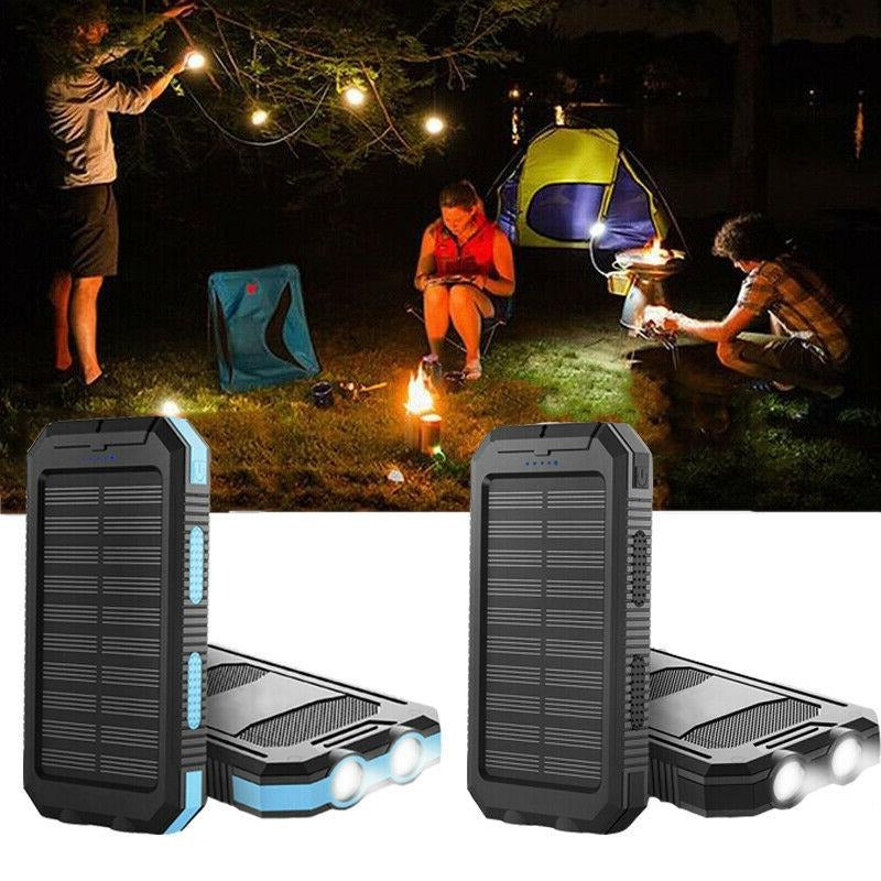 Hand holding the compact portable waterproof solar charger power bank for travel.