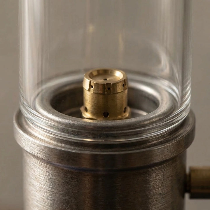 Outdoor camping gas candle lamp for tents, offering portable, windproof light & warm ambiance.