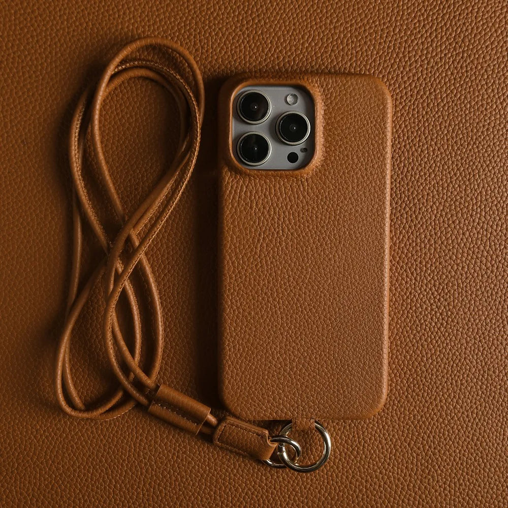Premium genuine leather crossbody smartphone case in a rich brown. Hands-free and stylish phone protection.
