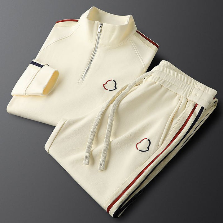 Back view of a men's premium quarter-zip activewear set, showcasing modern design.