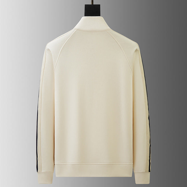 Men's premium quarter-zip tracksuit in gym, ideal activewear for training & warm-up.