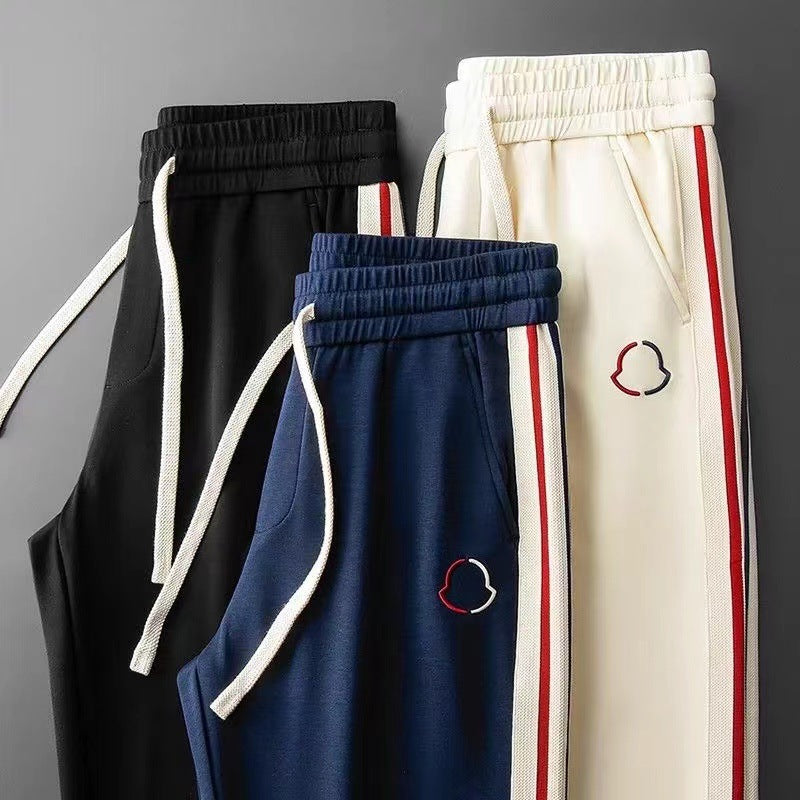 Durable men's premium quarter-zip tracksuit, a versatile matching set for active or casual use.
