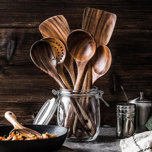 Premium teak wood kitchen utensil set, natural & eco-friendly for healthy cooking.