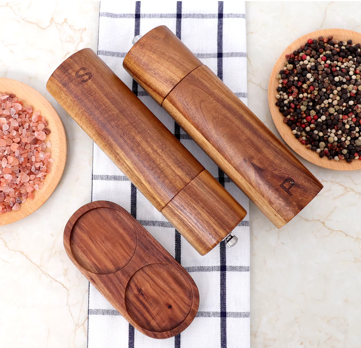 Assortment of teak wood kitchen utensils; spoons, spatulas & ladles for all cooking needs.