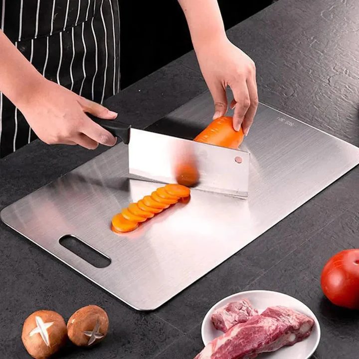 Sleek, portable titanium chopping board, an essential kitchen tool for efficient food prep.