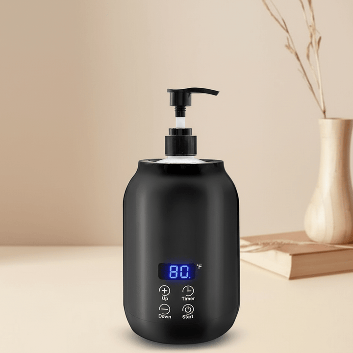 Compact electric massage oil warmer, perfect for estheticians, delivering warm oil for professional spa services.