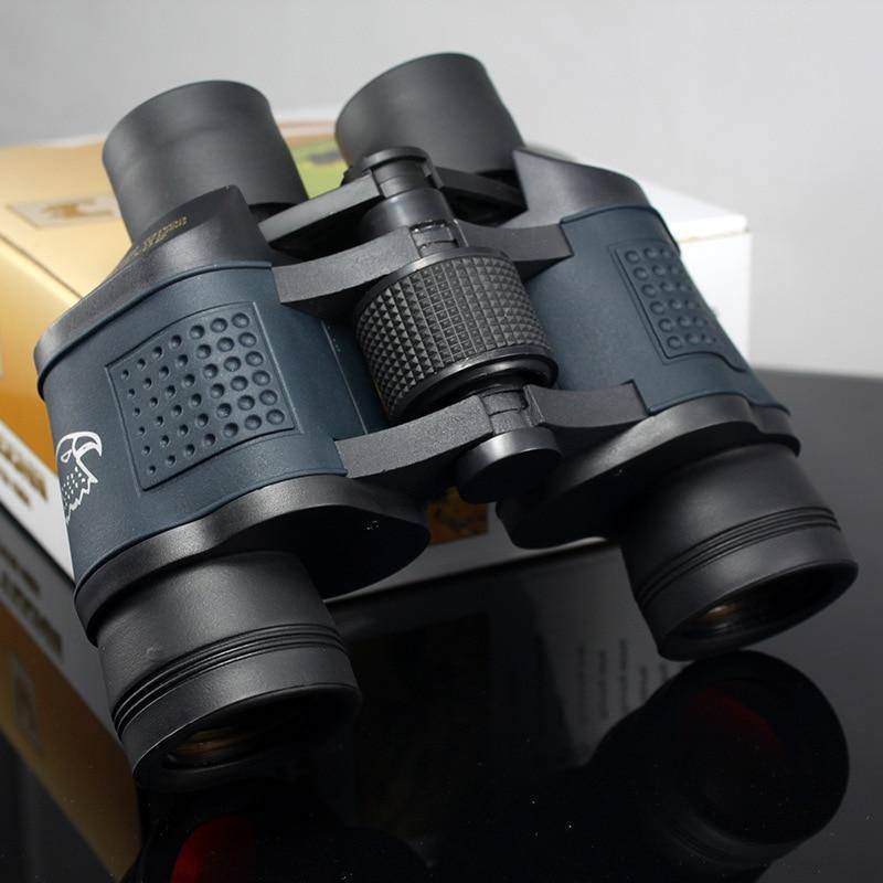 Compact outdoor binoculars, professional grade for hiking & long-range viewing. Side view.