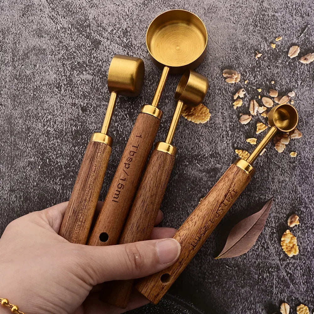 Modern stainless steel measuring spoons, natural wood handles, for functional kitchen decor and baking.