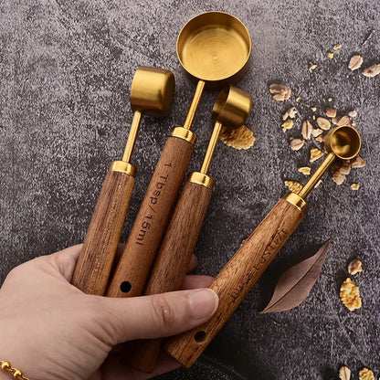 Modern stainless steel measuring spoons, natural wood handles, for functional kitchen decor and baking.